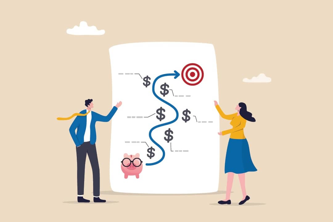 An illustration of two people reviewing a roadmap from a savings target to a financial milestone.